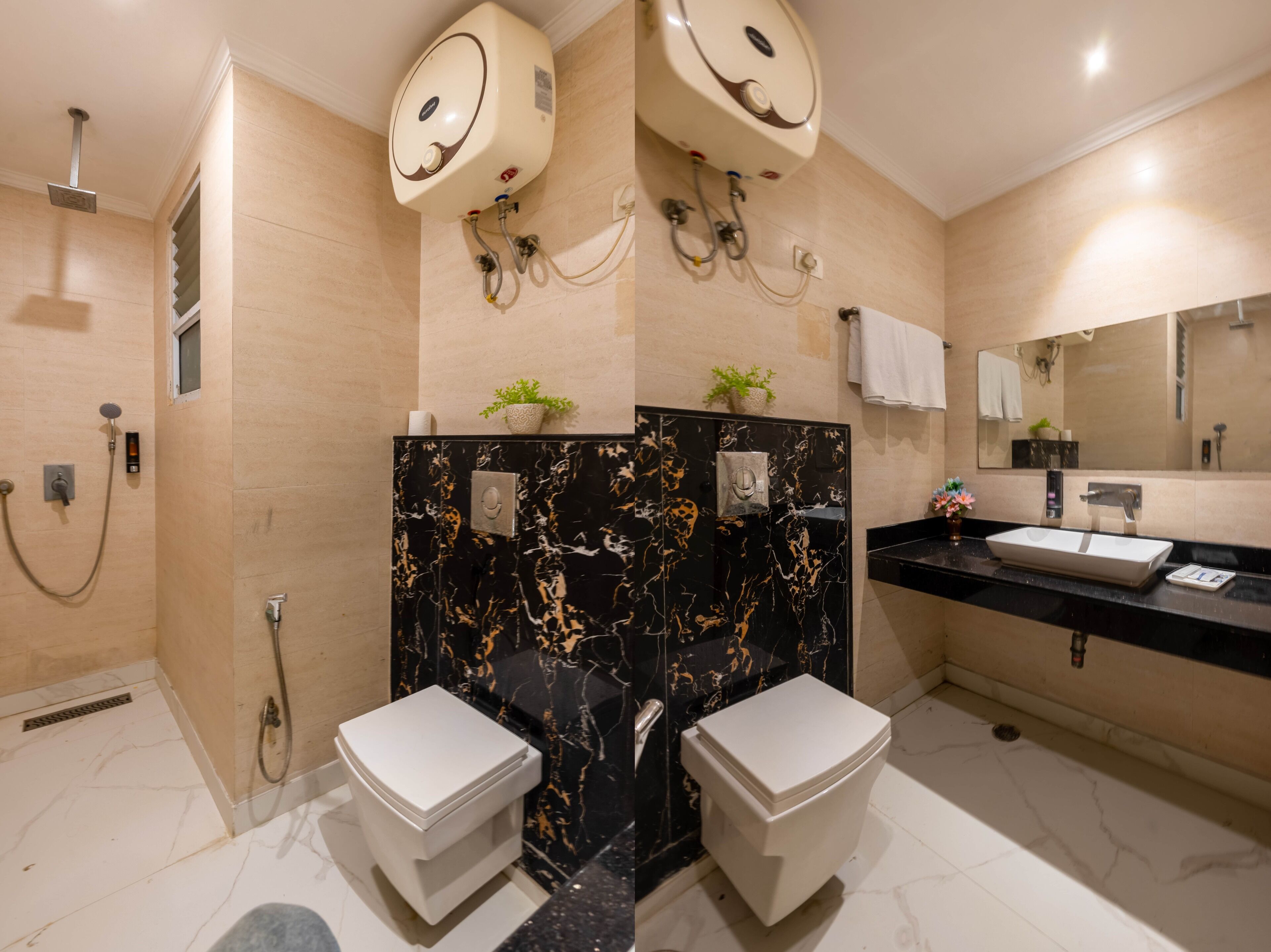 Une salle de bain moderne avec deux toilettes, un meuble-lavabo en marbre noir, un lavabo et une douche.