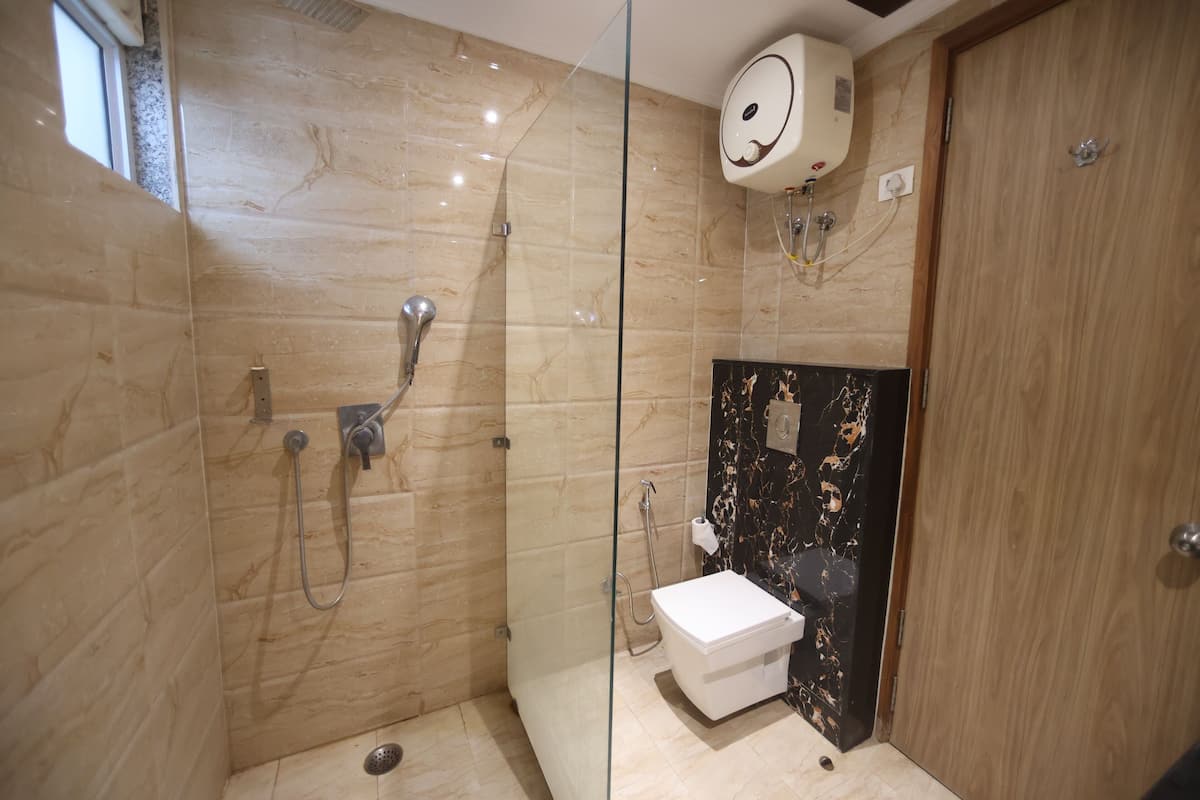Family Apartment | Bathroom | Shower, hydromassage showerhead, designer toiletries, hair dryer