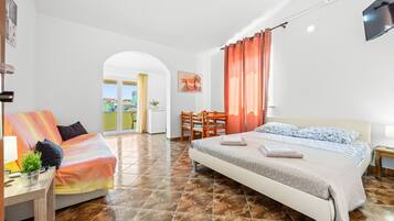 Iron/ironing board, travel crib, free WiFi, bed sheets