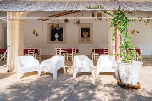 Outdoor dining - Room 'San Biagio - Deluxe 10' with Shared Pool, Wi-Fi, and Air Conditioning (Calimera)