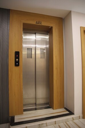 Chambre Double Deluxe | Coin séjour