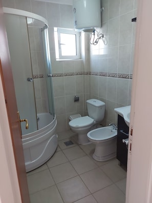 Hair dryer, bidet, towels, soap