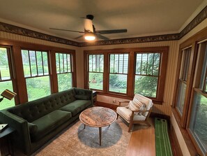Smart TV, fireplace, books, video library