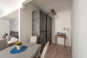 Studio | Living area | 30-inch TV with satellite channels