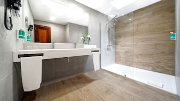 Shower, hair dryer, slippers, towels