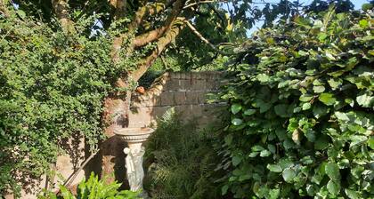 Tucked away in a quiet rural village with pub. Great walking and cycling country