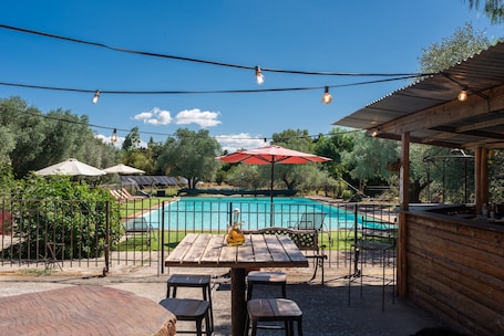 Outdoor dining. Holiday Home 'Chalet Sardane' with Mountain View, Shared Pool and Shared Terrace