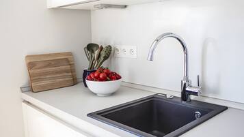 Réfrigérateur, four, plaque de cuisson, lave-vaisselle