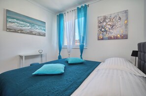 2 dormitorios, tabla de planchar con plancha, wifi y ropa de cama