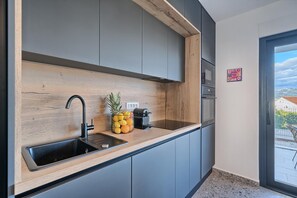 Réfrigérateur, four, plaque de cuisson, lave-vaisselle