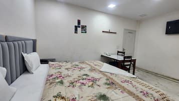 Desk, laptop workspace, free WiFi, bed sheets