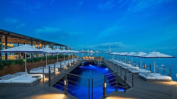 Outdoor pool, pool umbrellas, pool loungers