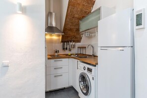 Microones, placa de cuina i tovallons de paper