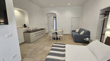 Comfort Studio, City View | Living area | 43-inch Smart TV with digital channels