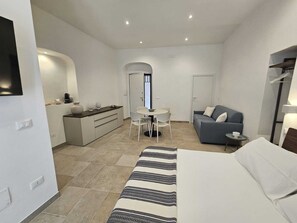 Comfort Studio, City View | Living area | 43-inch Smart TV with digital channels