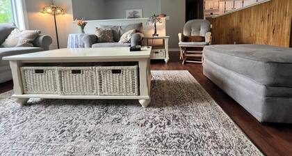 Spacious five-bedroom home off Back Lake with direct trail access on Spooner Rd