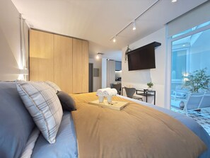 1 slaapkamer, een strijkplank/strijkijzer, wifi, beddengoed