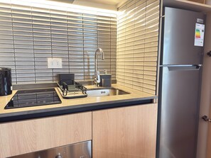 Fridge, microwave, oven, stovetop - HOM I Loft Terraza Planta baja Familiar Lastarria (Santiago)