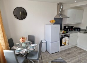 Fridge, microwave, oven, cookware/dishes/utensils