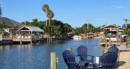 Spacious waterfront home with private pool, sunroom and dock.