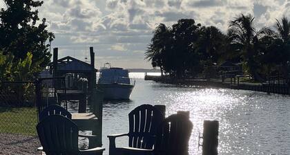 Spacious waterfront home with private pool, sunroom and dock.