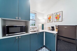 Fridge, microwave, coffee/tea maker, toaster