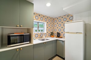 Fridge, microwave, coffee/tea maker, toaster