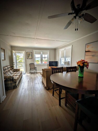 3 cozy bedrooms, sleeping a total of 6 guests<br>Partial water views of the beautiful bay<br>Large deck and grassy yard for outdoor enjoyment