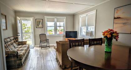 3 cozy bedrooms, sleeping a total of 6 guests<br>Partial water views of the beautiful bay<br>Large deck and grassy yard for outdoor enjoyment