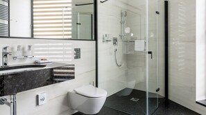 Shower, hair dryer, slippers, towels