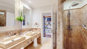 Shower, hair dryer, towels, soap