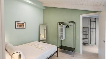 1 habitación, tabla de planchar con plancha, wifi y ropa de cama
