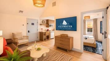 Executive Triple Room, Multiple Beds, Non Smoking, Kitchenette | Living area | 42-inch Smart TV with digital channels