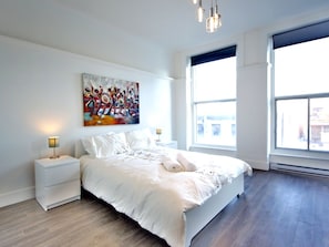 1 bedroom, desk, iron/ironing board, travel crib