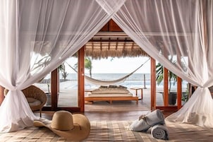 Deluxe Suite, Beach View | In-room safe, laptop workspace, blackout drapes, free WiFi