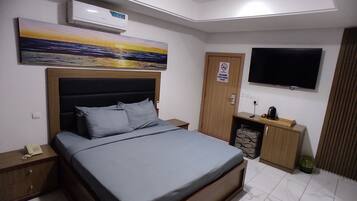 Quarto standard | Roupas de cama premium, cortinas blackout, Wi-Fi de cortesia
