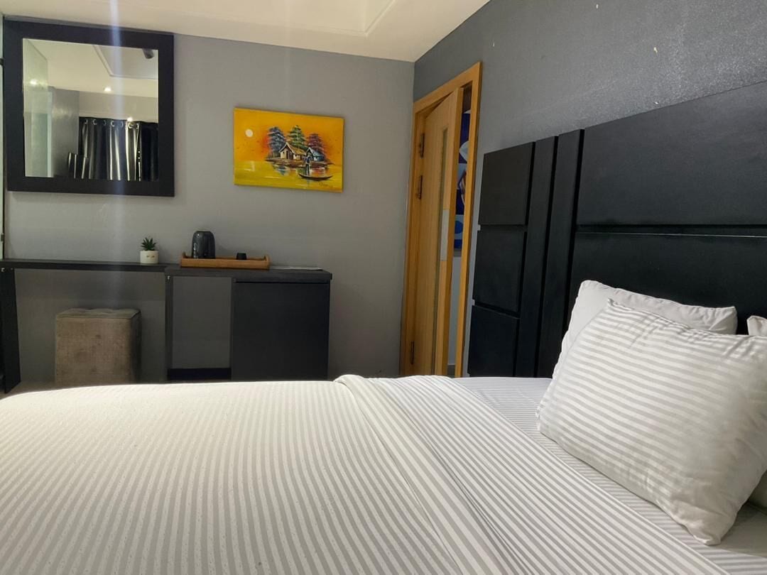 Premium bedding, blackout curtains, free WiFi, bed sheets