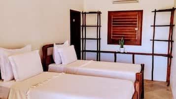 Cofres nos quartos, cortinas blackout, Wi-Fi de cortesia