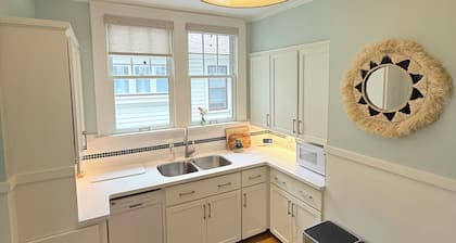 BEST Possible location for everything and anything in GR! The home is all charm!
