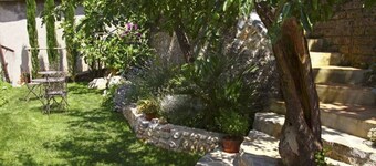 In the Tuscan Maremma, village center, with gardens suspended between heaven and earth