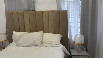 2 bedrooms, iron/ironing board, WiFi, bed sheets