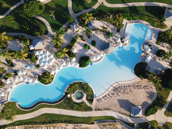 Outdoor pool, open 7:00 AM to 10:00 PM, pool umbrellas