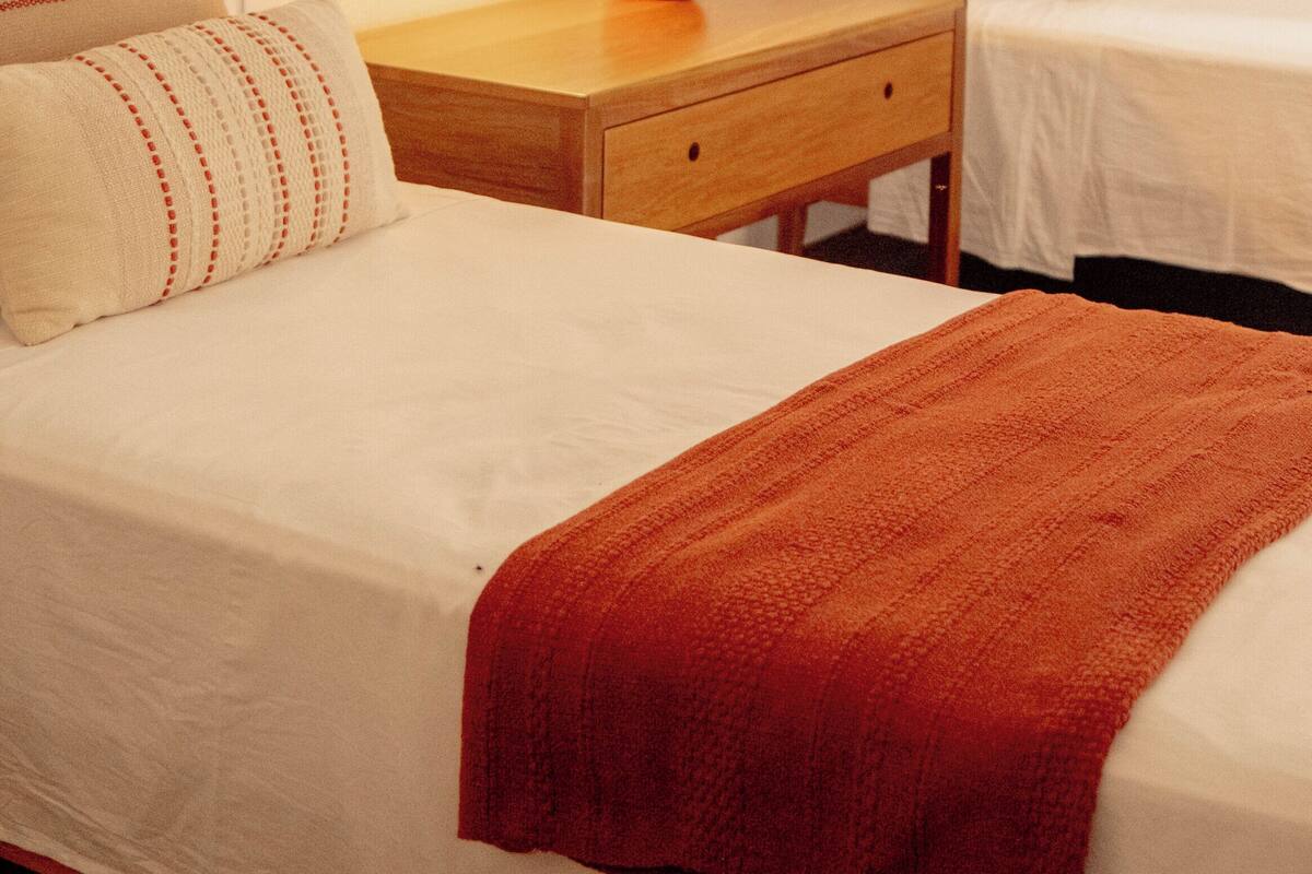 Laptop workspace, blackout curtains, free WiFi, bed sheets