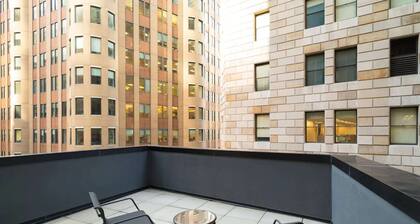Steps from Wall Street + Fitness Room & Wi-Fi