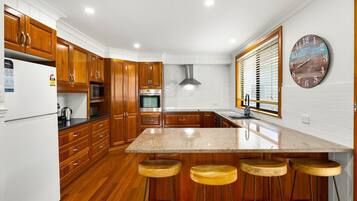 Microwave, stovetop, dishwasher, coffee/tea maker