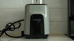 A kitchen with a white countertop and a blender.