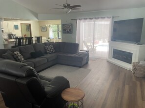 Smart TV, fireplace, books