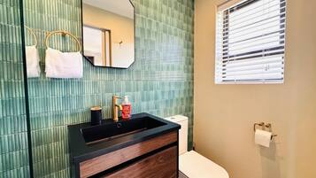 Shower, towels, toilet paper