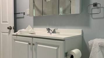 Hair dryer, towels, soap, toilet paper