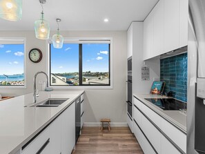 Fridge, microwave, dishwasher, cookware/dishes/utensils